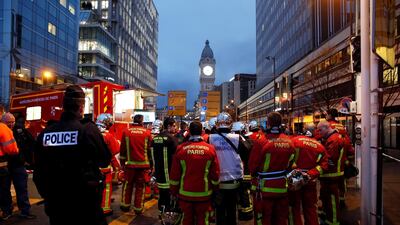 French firefighters assembled near the historic station. Reuters