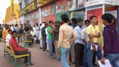 Amnesty seekers lining up outside the Emirates ID office in Mussafah before the February 4 amnesty deadline. Delores Johnson / The National