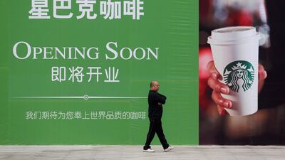 An advertising board of Starbucks in Wuhan, Hubei province, China. The US firm is t=argeting the country for growth. Reuters