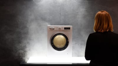A Siemens washing machine that uses active oxygen to get smells out of clothing is presented to media at IFA in Berlin, Germany. Rainer Jensen / EPA