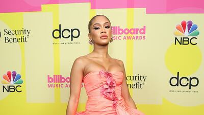 Saweetie poses backstage for the 2021 Billboard Music Awards, broadcast at Microsoft Theatre in Los Angeles, California. Getty Images