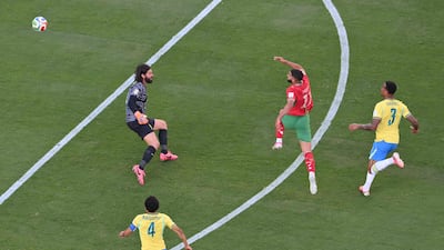 Morocco's Ismael Saibari, centre, scores his team's first goal during the 2026 World Cup Group C match with Brazil at the MetLife Stadium in New Jersey. AFP