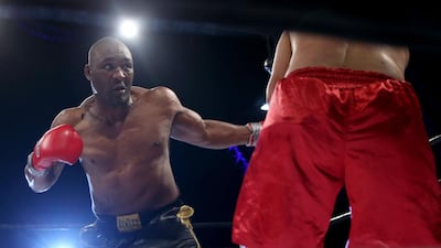 Danny Williams, left, fights Mazur Ali flight during a boxing match on Yas Island in Abu Dhabi December 19, 2013. Williams won the match and is scheduled to be in the main event in Dubai on May 1. Sammy Dallal / The National
