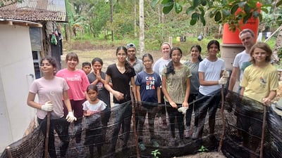 Pupils from the school working with children in Indonesia
