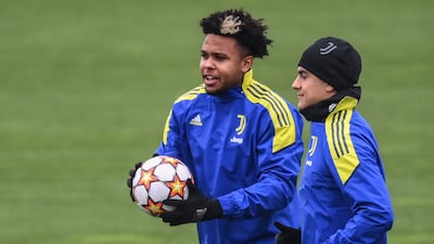Weston McKennie, left, and Paulo Dybala attend a training session at the Continassa training ground in Turin. AFP