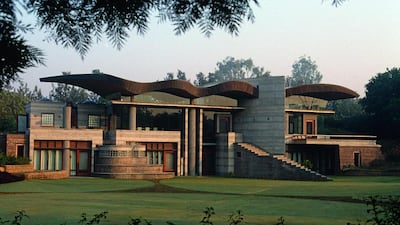 The exterior of the Poddar residence, designed by Indian Inni Chatterjee, has an undulating, copper-wrapped roof. Photo by Henry Wilson