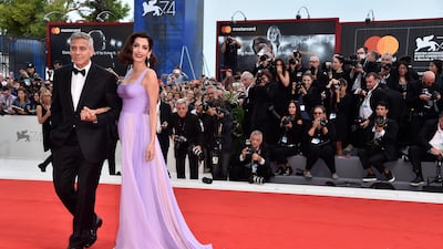 George Clooney and Amal Clooney on the red carpet for Suburbicon at the 74th Venice Film Festival on September 2. Pascal Le Segretain / Getty Images