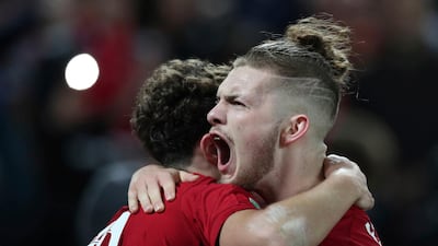 Liverpool's Harvey Elliott, right, and Liverpool's Curtis Jones celebrate. AP
