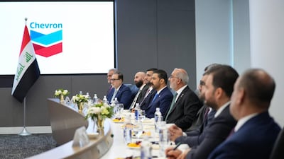 Iraq Prime Minister Ali Al Zaidi (fifth from left) and a delegation hold talks with Chevron at its headquarters in Houston, Texas. Iraqi Prime Minister's Office
