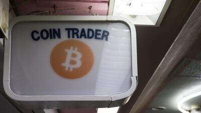 A Coin Trader bitcoin retail store. Its value has fallen along with others after nChina banned initial coin offerings. Tomohiro Ohsumi/Bloomberg