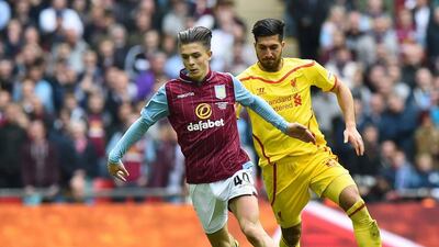 Aston Villa's Jack Grealish dribbles away from Emre Can on Sunday during their FA Cup semi-final clash. Ben Stansall / AFP / April 19, 2015
