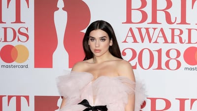 Dua Lipa - who is coming to Abu Dhabi this weekend - also had a go-big-or-go-home moment on the red carpet, choosing pink frothy Giambattista Valli Couture (which is, to be honest, giving us 'mesh shower pouf' vibes). John Phillips / Getty Images
