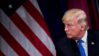US president Donald Trump waits for a meeting with Qatar's Emir Sheikh Tamim bin Hamad at the Palace Hotel in New York City, on the sidelines of the United Nations General Assembly on September 19, 2017. Brendan Smialowski / AFP
