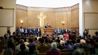 Relatives and friends of Christian Assad Labib attend his funeral at the Anglican Church in Sawaada village. AFP