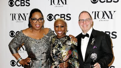 Oprah Winfrey wears metallic brocade to attend the Tony Awards with Cynthia Erivo and Scott Sanders in New York on June 12, 2016. EPA