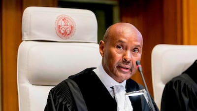 A handout photo released by the International Court of Justice shows International Court of Justice (ICJ) Judge and court president Abdulqawi Ahmed Yusuf speaking during a public hearing in the case concerning the Application of the Convention on the Prevention and Punishment of the Crime of Genocide (The Gambia v. Myanmar) at the Peace Palace in The Hague. AFP