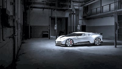 Its flat front and three-part air intakes reinterpret the shape of the Veyron.