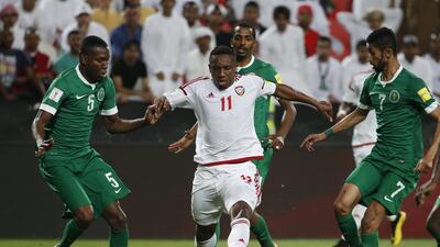 UAE’s Ahmed Khalil takes on the Saudi Arabia team during the 2018 World Cup qualifier in Abu Dhabi. AFP