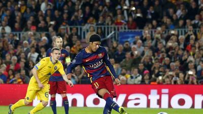 Barcelona’s Neymar scores the opening goal from the penalty spot during their Champions League match against Bate Borisov on Wednesday night. Manu Fernandez / AP