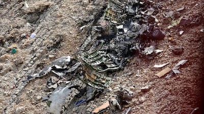 This photo provided by Mizan News Agency, shows the the wreckage of a Turkish private jet that crashed on Sunday in the Zagros Mountains, outside of the city of Shahr-e Kord in Iran. Asal Bigdeli / Mizan News Agency via AP.