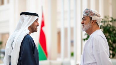 Sheikh Mohamed speaks with Sultan Haitham after a meeting. Hamad Al Kaabi / UAE Presidential Court
