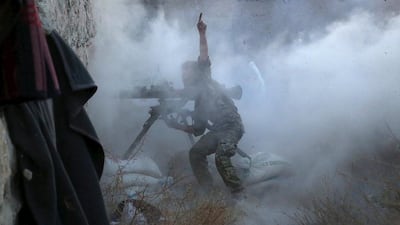 A rebel fighter during clashes with forces loyal to Syria’s president Bashar Al Assad on the frontline of Aleppo’s Sheikh Saeed neighbourhood on May 23, 2015. Regime forces are fighting the Free Syrian Army as well as ISIL in Syria’s civil war. Hosam Katan/Reuters