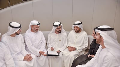 Sheikh Mohammed bin Rashid, Vice President, Prime Minister and Ruler of Dubai, and Mohammed Al Gergawi, Minister of Cabinet Affairs and the Future, witness the first marriage contract performed at the Service 1 centre which opened on Saturday. Wam
