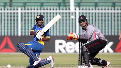 Hashan Dumindu, left, of Sri Lanka Under 19s plays a shot against UAE Under 19s. Pawan Singh / The National