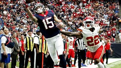 Houston Texans 19 Kansas City Chiefs 12: Texans receiver Will Fuller reaches for the ball against Chiefs player Marcus Peters. Larry W Smith / EPA
