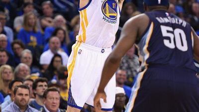 Klay Thompson of the Golden State Warriors shoots the ball in the second half against the Memphis Grizzlies during the game at Oracle Arena on April 13, 2016 in Oakland, California. Thearon W Henderson/Getty Images/AFP