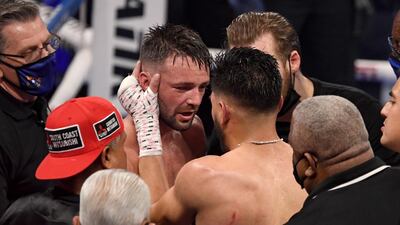 Josh Taylor speaks with Jose Ramirez after the fight. AFP