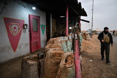 Troops from Syria's Interior Ministry guard Al Omar oilfield. Getty Images