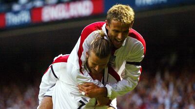 England captain David Beckham is congratulated by Phil Neville after scoring England's opening goal against Croatia in 2003. PA
