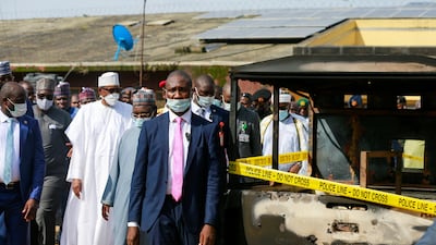 Nigeria's President Muhammadu Buhari inspects Kuje prison, after gunmen released Boko Haram fighters held at the prison in Abuja, Nigeria. Reuters