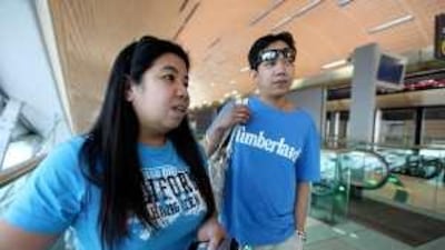 Mary Jane Aratan and her husband Jhay Fortes at Al Karama station yesterday.