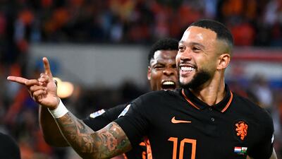Netherlands' Memphis Depay celebrates scoring the decisive goal in the 3-2 Nations League victory against Wales in Rotterdam on June 14, 2022. Reuters