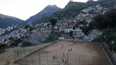 A view of a Sunday "pelada" football match in the Borel favela of Rio de Janeiro, a World Cup host city, on May 4, 2014. Sunday football is a decades-old tradition when Brazilians of all walks of life play on the beaches, in the slums, and on the streets in matches that are known as "peladas" or "naked". Ricardo Moraes / Reuters