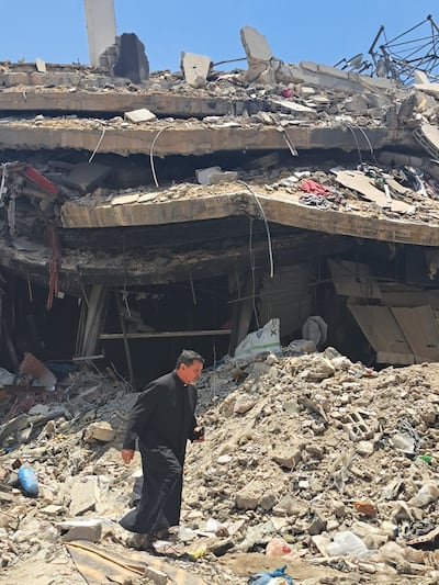 A Catholic priest walks in the neighbourhood surrounding the Holy Family Catholic Church in Gaza. Photo: Holy Family Church