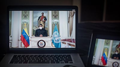 Nicolas Maduro, Venezuela's president, wears a protective mask before speaking during the United Nations General Assembly seen on a laptop computer in Hastings on the Hudson, New York, U.S., on Wednesday, Sept. 23. 2020. The United Nations General Assembly met in a virtual environment for the first time in its 75-year history due to the pandemic. Photographer: Tiffany Hagler-Geard/Bloomberg