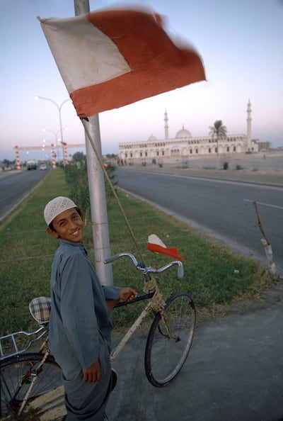 A boy in Dubai celebrates UAE independence in Dubai in 1971. The flag attached to his bike is that of Abu Dhabi before the introduction of the UAE flag. Bruno Barbey / Magnum Photos / arabianEye.com