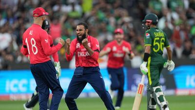 Adil Rashid of England celebrates after taking the wicket of Mohammad Haris of Pakistan. Getty