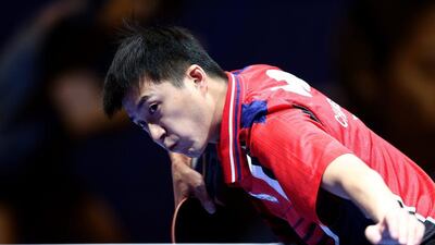 Chiang Hung-chieh of Chinese Taipai in action against Jung Youngsik of Korea during Day 1 of the 2016 Table Tennis Asian Cup at Dubai World Trade Centre on April 28, 2016 in Dubai. (Photo by Warren Little/Getty Images)
