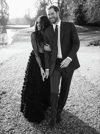 Britain's Prince Harry and Meghan Markle pose for an official engagement photo, at Frogmore House, in Windsor, England