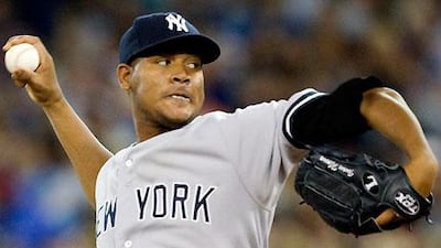 Ivan Nova pitches against the Toronto Blue Jays