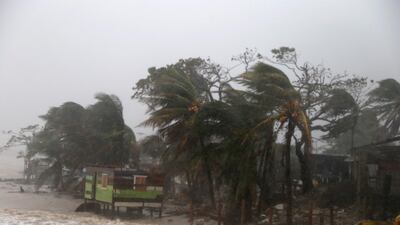 Palm trees blow by wind as Nicaragua prepares to receive hurricane Iota in Puerto Cabezas, Nicaragua. Less than two weeks after being hardly affected by Hurricane Eta, villagers of Puerto Cabezas take precautions before landfall of Iota. Iota is the 13th hurricane of the season to hit the Atlantic coast and has already strengthened to category five, threatening the area with catastrophic winds and heavy rains. Getty Images