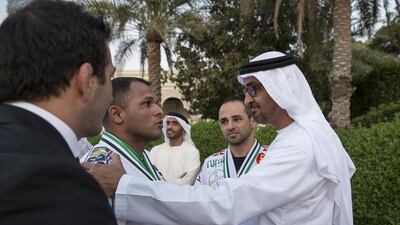 Sheikh Mohammed bin Zayed, Crown Prince of Abu Dhabi and Deputy Supreme Commander of the Armed Forces, speaks with a winner of the Abu Dhabi World Professional Jiu-Jitsu Championship 2016, seen during a Sea Palace barza. Ryan Carter / Crown Prince Court - Abu Dhabi