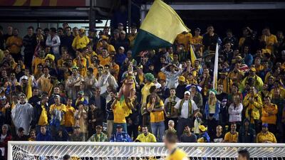 Australia fans cheer during their team's Asian Cup semi-final win against the UAE on Tuesday. Jason Reed / Reuters