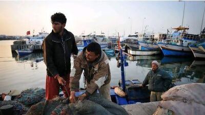 Fishermen from Mahdia in the port of Zarzis, Tunisia, which is quiet again after a brief flood of illegal emigrants.