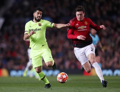 Victor Lindelof, right, seen sparring for the ball with Luis Suarez, says Manchester United have a capacity for greatness. Lee Smith / Reuters