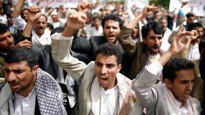 Followers of the Shiite Houthi group, also called Ansarullah, march to demand Yemen's National Security Agency be disbanded, in Sanaa.